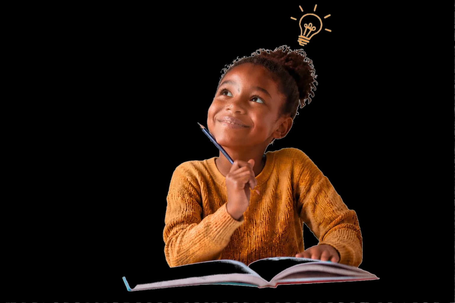 A primary-school learner smiling while reading a book